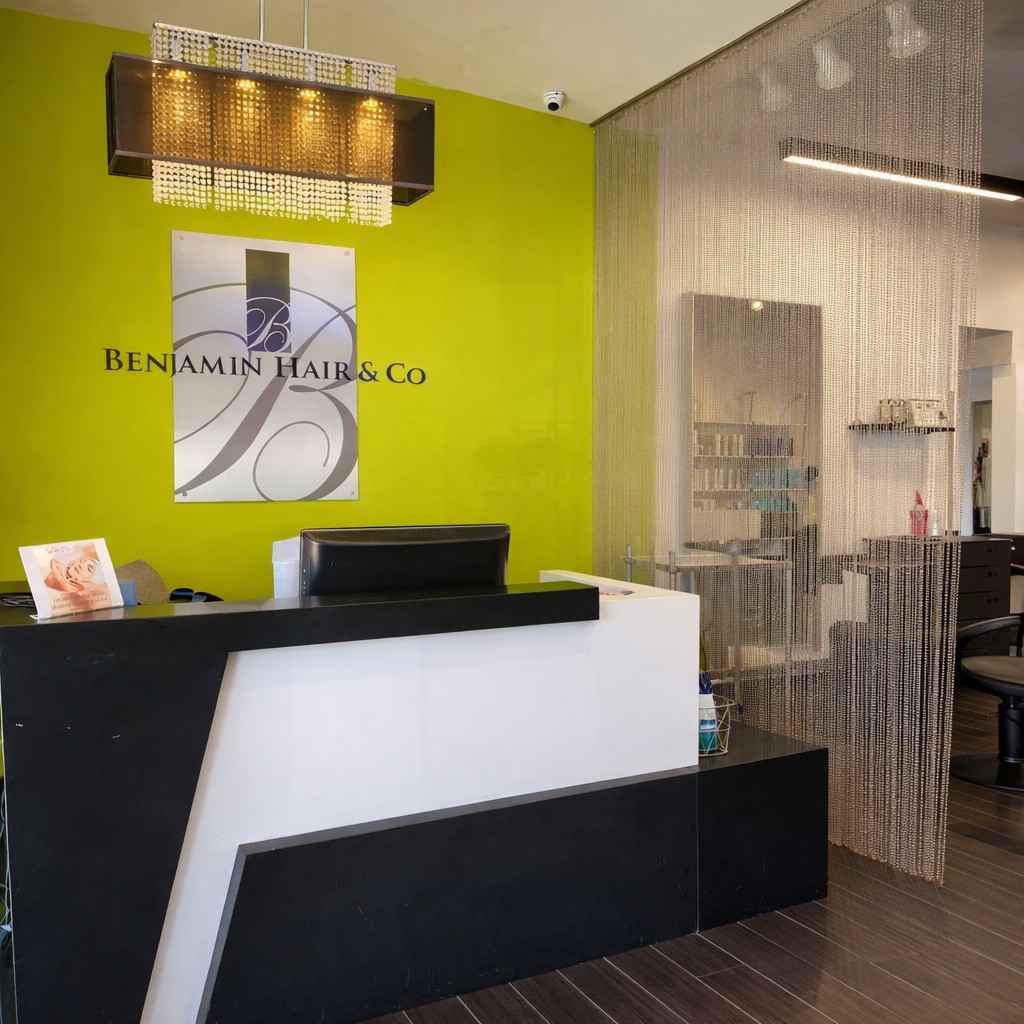 Modern hair salon reception area with front desk